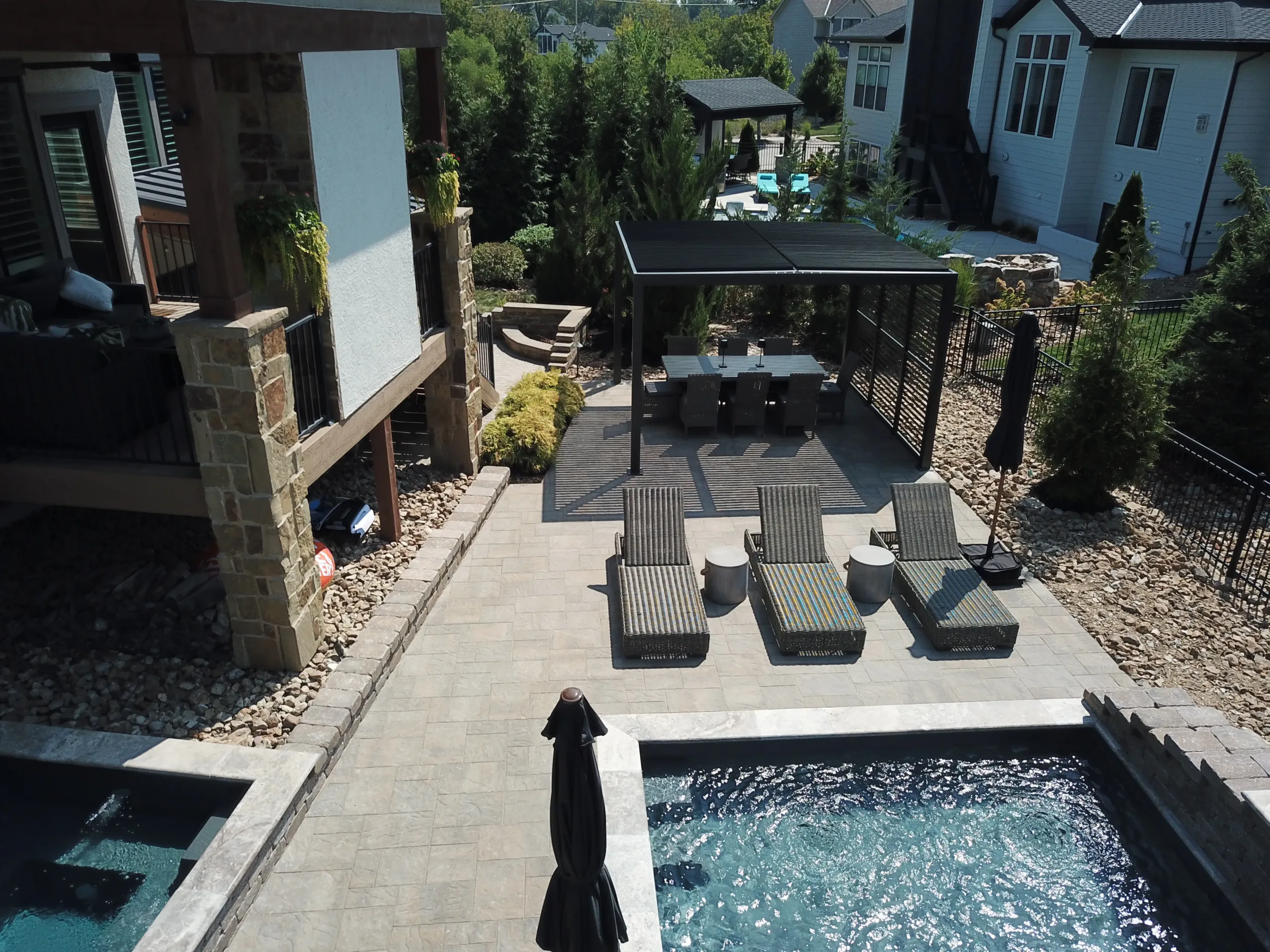 Aerial view of completed fiberglass pool and spa installation in Johnson County Kansas