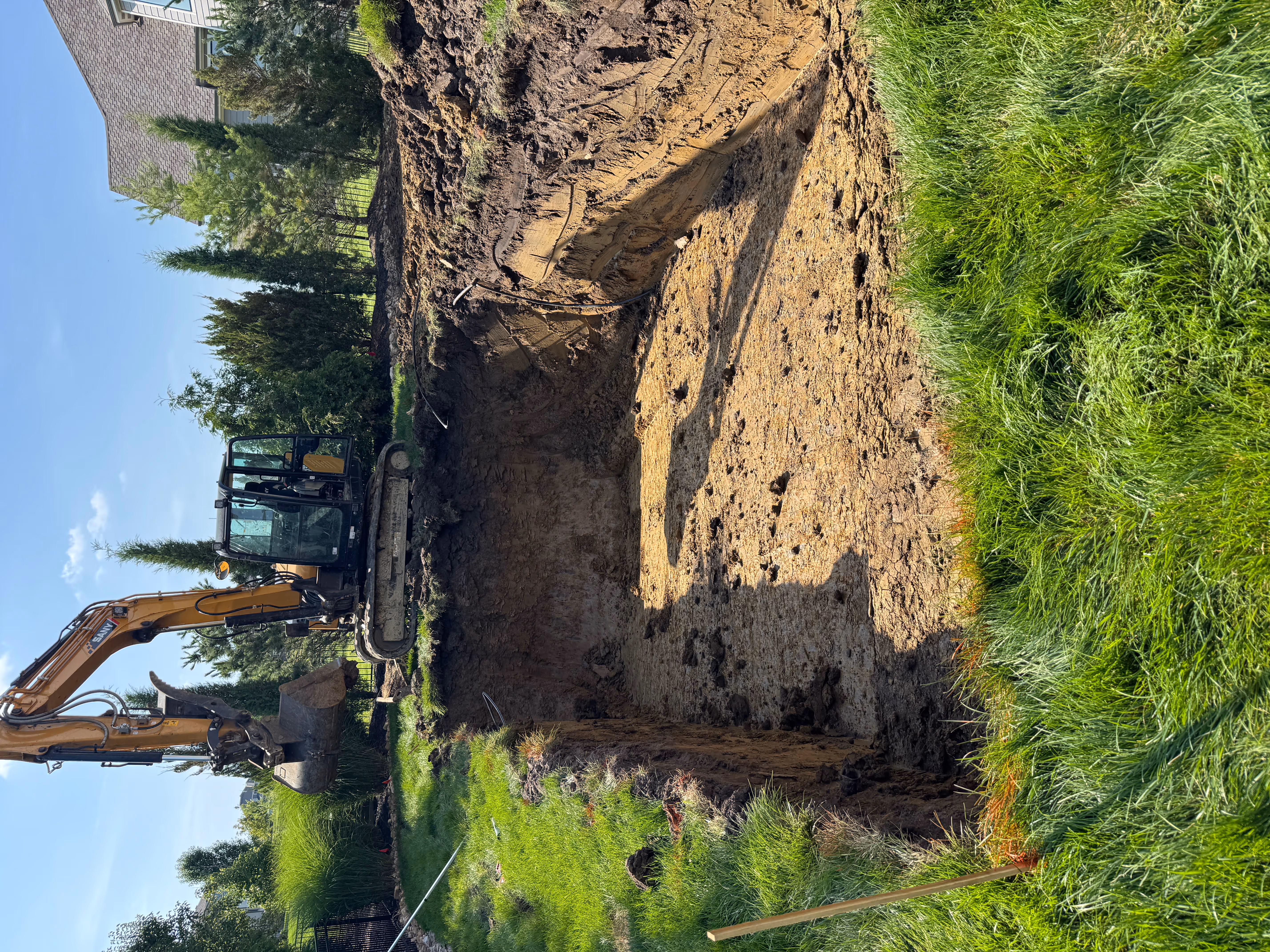 Reflection31 w Pad Overland Park fiberglass pool install hole dig 01 — Hometown Pool Kansas